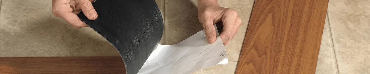 A professional installing vinyl flooring in Bradenton, FL